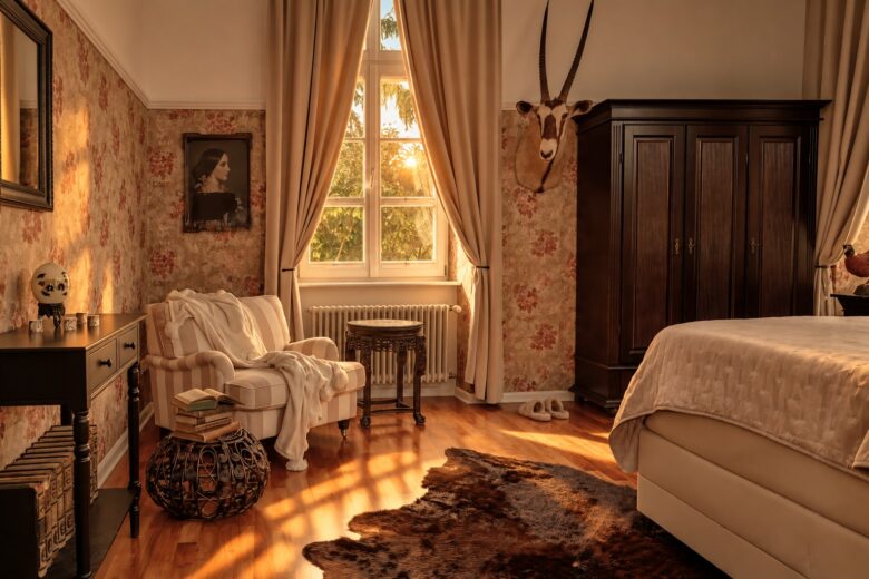 Private bedroom of the Grand Two-Bedroom Residence Heidelberg in warm summer evening light