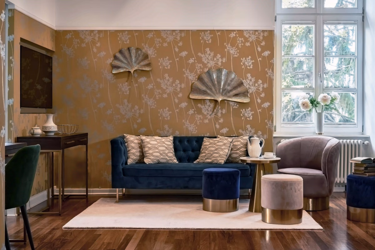 Elegant living area with velvet sofa and stylish seating in the two-bedroom Superior Residence.