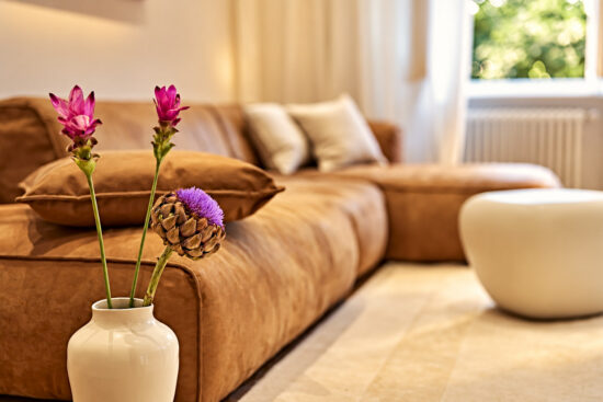 Floral arrangement in a warm and elegant living area atmosphere