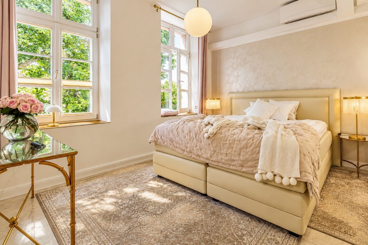 Private king bedroom with adjustable bed in the Medical Stay Two-Bedroom Suite Heidelberg