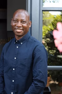 Friendly concierge in Heidelberg offering personalised guest services.