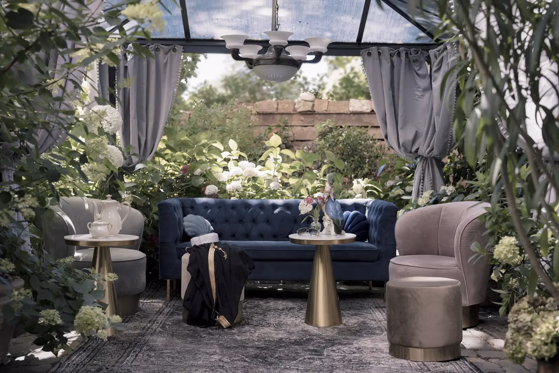 Elegant private garden lounge with velvet seating and refined décor at Boutique Suites & Residences Heidelberg.
