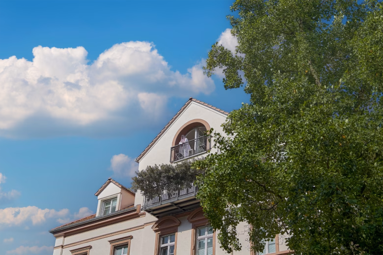 Guest enjoying the private balcony of Boutique Suites & Residences Heidelberg, ideal for long stays.