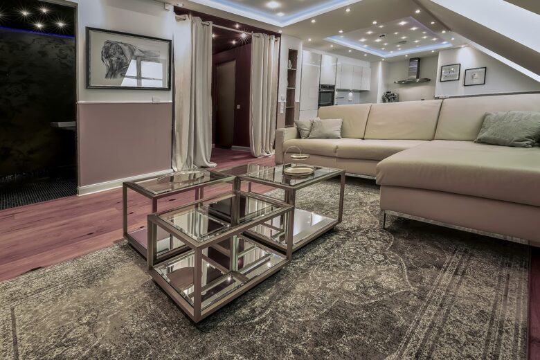 Private living room with lounge seating and kitchen in the One-Bedroom Residential Suite Heidelberg