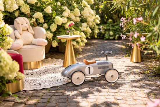 Cozy garden corner with toy car and plush bunny – perfect for families with children in Heidelberg.