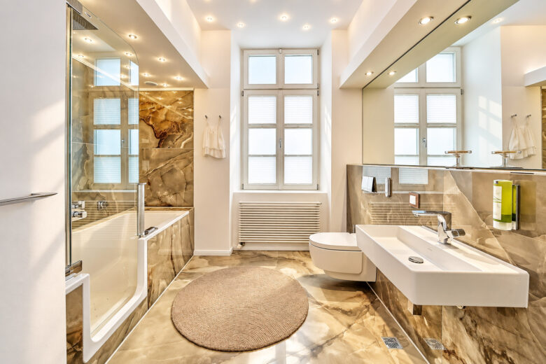Bright bathroom in the Imperial Two-Bedroom Suite Heidelberg with warm spring morning light