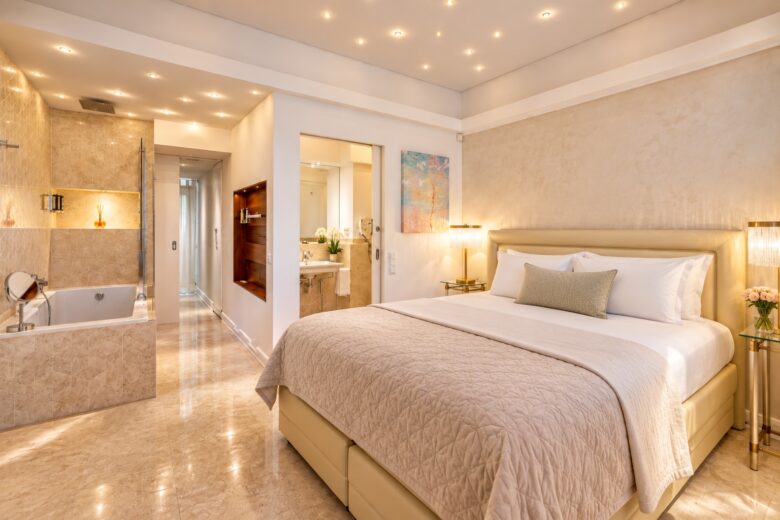 Elegant second bedroom in the Signature Two-Bedroom Suite Heidelberg with professionally prepared king-size bed and direct access to a private bathroom