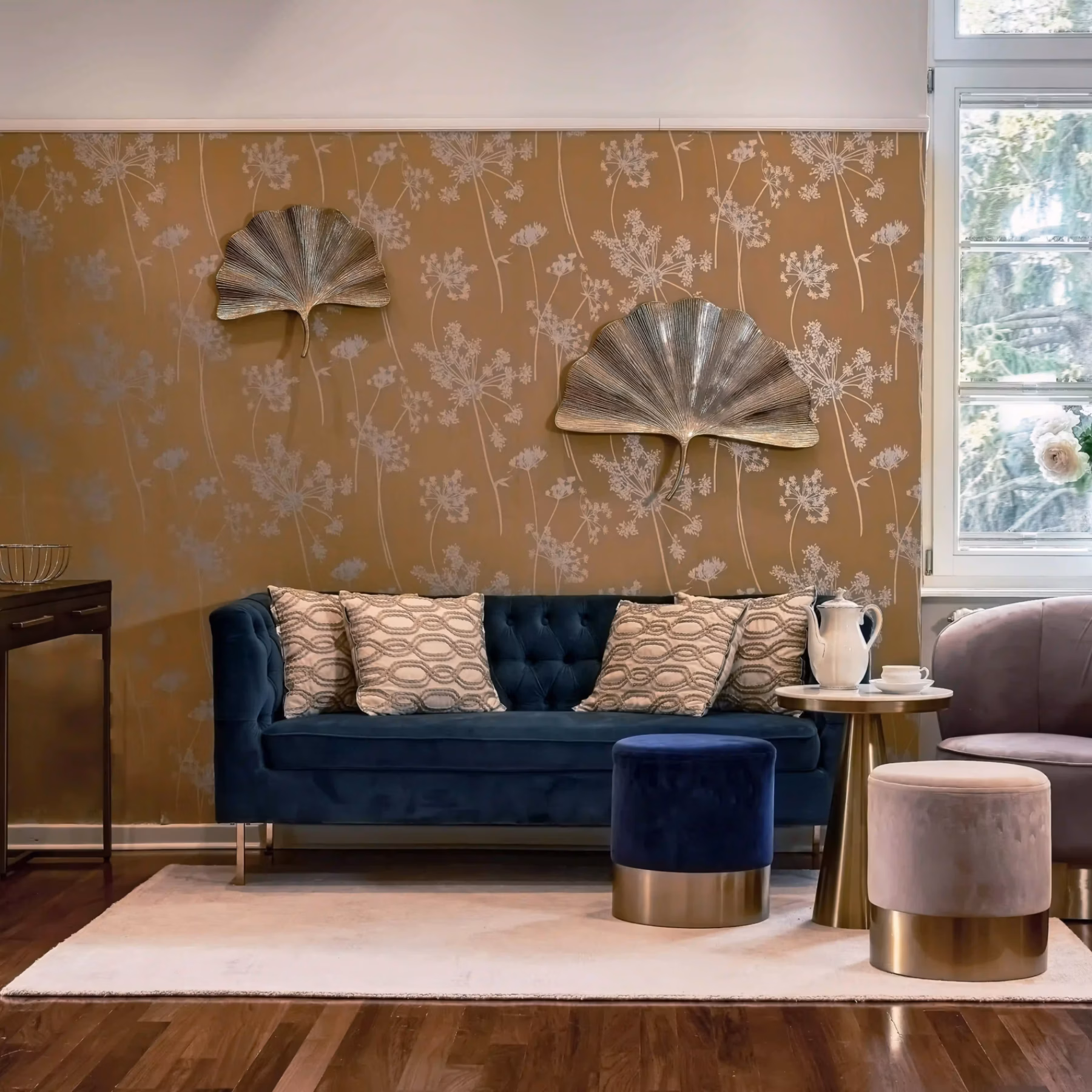 Elegant living area with velvet sofa and stylish seating in the two-bedroom Superior Residence.